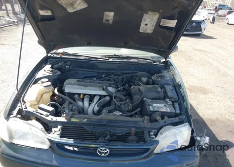 1999 Toyota Corolla Ve from USA, damaged, VIN 2T1BR12E3XC142453